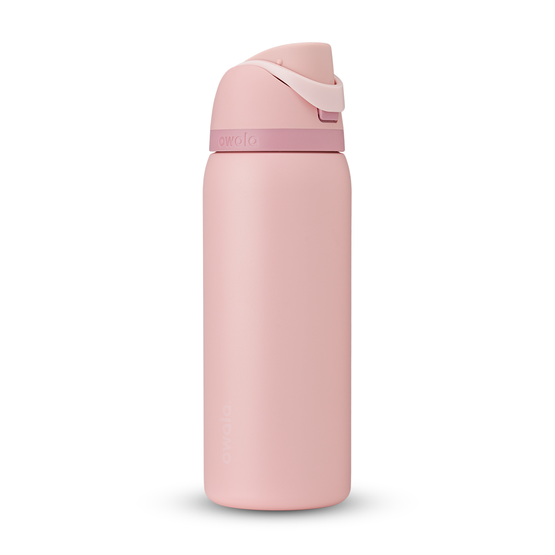 FreeSip 32oz in Rose Quartz, soft pink body with matching pink flip cap, light pink carry loop, and dusty mauve accent band